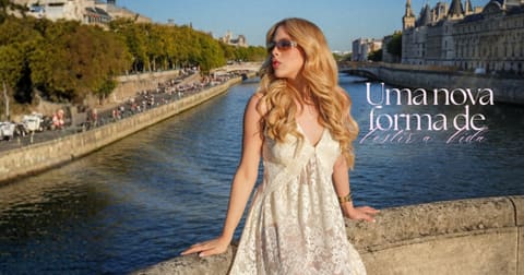 Modelo de vestido longo de renda branca numa ponte sobre o rio, com o texto: Uma nova forma de vestir a vida